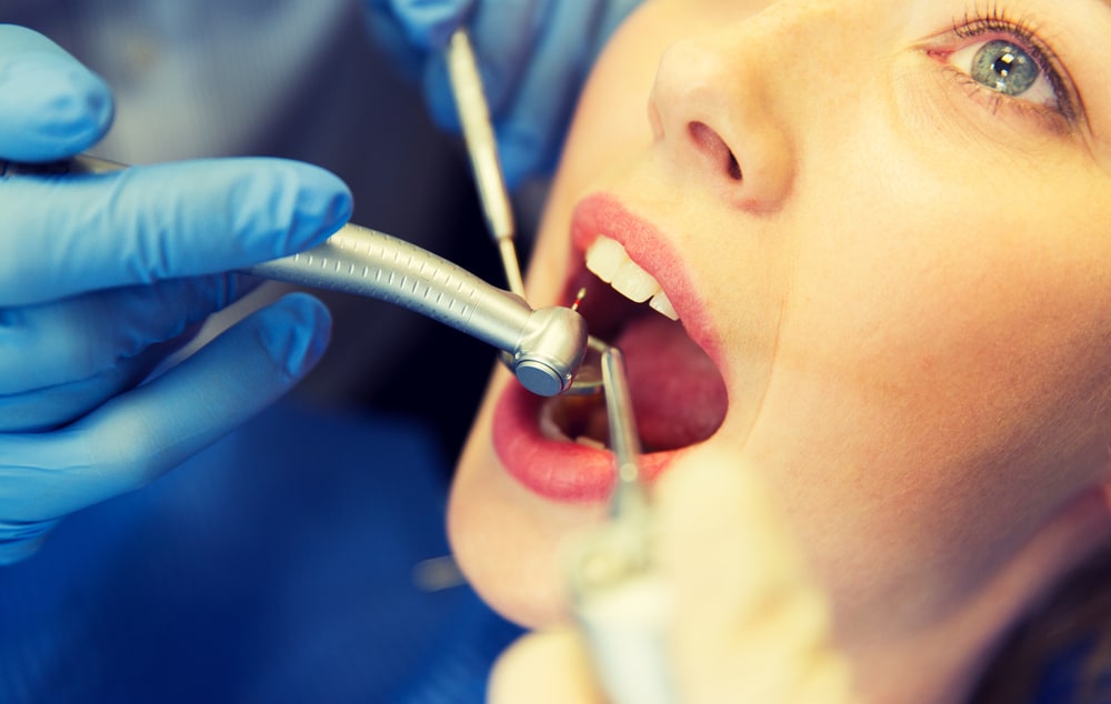 Woman getting dental treatment